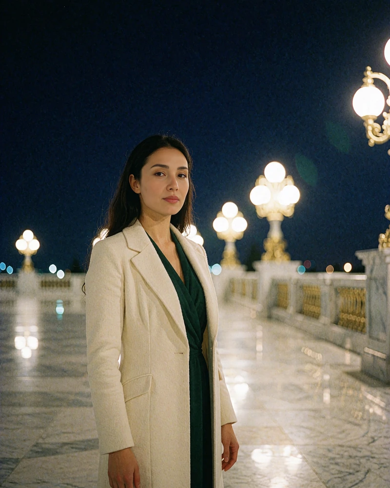 Turkmen member in an ivory coat standing on an illuminated marble plaza at night